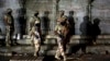 Pakistani paramilitary troops take up positions during a gunbattle with militants in Karachi, Pakistan, April 25, 2017. 